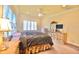 Comfortable bedroom with natural light, shutters, ceiling fan, and a warm, inviting atmosphere at 441 Lucerne Ave, Tampa, FL 33606