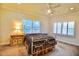Bedroom with shuttered windows, ceiling fan, and neutral carpet for a cozy feel at 441 Lucerne Ave, Tampa, FL 33606