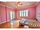 Bedroom with hardwood floors and large windows to allow for plenty of natural light at 441 Lucerne Ave, Tampa, FL 33606
