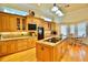 Gourmet kitchen with custom cabinets, granite countertops, and stainless steel appliances at 441 Lucerne Ave, Tampa, FL 33606