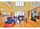 A living room with wood floors, natural lighting, and an entertainment center at 441 Lucerne Ave, Tampa, FL 33606