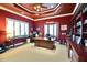 Spacious office with coffered ceiling, plantation shutters, and custom cabinets offering ample storage at 441 Lucerne Ave, Tampa, FL 33606