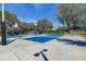 Community basketball and soccer courts with lush trees, offering a great outdoor space for recreation and sports at 5460 Millbrook Way, Palm Harbor, FL 34685