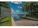 Community boat ramp with clear signage, located on private property with access to the lake, and beautiful blue skies at 5460 Millbrook Way, Palm Harbor, FL 34685