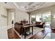 Relaxing living area with hardwood floors and pool view at 5460 Millbrook Way, Palm Harbor, FL 34685