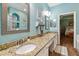 Inviting bathroom with granite countertop and double sinks at 5702 Tides Pl, Apollo Beach, FL 33572