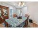 Inviting dining area with wood floors and easy access to the outside at 5702 Tides Pl, Apollo Beach, FL 33572