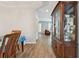 Spacious dining room featuring a china cabinet with wood floors at 5702 Tides Pl, Apollo Beach, FL 33572