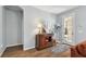 Welcoming entryway with a wooden console table, stylish decor, and a view of the outdoor space at 5702 Tides Pl, Apollo Beach, FL 33572