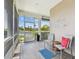 Relaxing screened-in porch with comfortable seating and tranquil view at 5702 Tides Pl, Apollo Beach, FL 33572