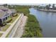 Scenic waterfront property with lush greenery and serene water views, perfect for boating at 5702 Tides Pl, Apollo Beach, FL 33572