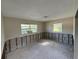 This bedroom awaits restoration, offering blank canvas of exposed infrastructure and natural light to create your dream space at 6609 Sierra Ter, New Port Richey, FL 34652