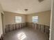 This bedroom awaits restoration, offering blank canvas of exposed infrastructure and natural light to create your dream space at 6609 Sierra Ter, New Port Richey, FL 34652
