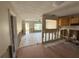 Open concept living room and kitchen combination, needing renovation at 6609 Sierra Ter, New Port Richey, FL 34652