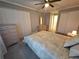 Spacious bedroom featuring neutral decor, tile flooring and ample closet space at 605 Brandy Wine Dr # 605, Largo, FL 33771