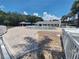 Community pool area with lounge chairs and well-maintained landscaping at 605 Brandy Wine Dr # 605, Largo, FL 33771