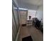Enclosed porch with tile floor and windowed door and panels at 605 Brandy Wine Dr # 605, Largo, FL 33771