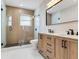 Bright bathroom with dual vanity, stand up shower, and modern fixtures at 623 15Th Nw Ave, Largo, FL 33770