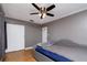 Comfortable bedroom with ceiling fan, large closet and convenient access to the bathroom at 6801 5Th N St, St Petersburg, FL 33702