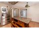 Bright kitchen featuring stainless steel appliances and an island with granite countertop at 6801 5Th N St, St Petersburg, FL 33702