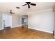 Spacious living room with ceramic tile floors and ceiling fans at 6801 5Th N St, St Petersburg, FL 33702