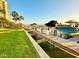 Beautiful boat dock featuring boat lift with direct access to the water and nearby building at 690 Island Way # 707, Clearwater Beach, FL 33767