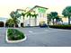 Exterior view of the local grocery store, Publix, with palm trees in the parking lot at 690 Island Way # 707, Clearwater Beach, FL 33767