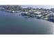 Picturesque waterfront view featuring a mix of residential and commercial properties along the coast at 690 Island Way # 707, Clearwater Beach, FL 33767