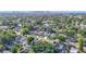 An aerial view of a quiet residential neighborhood in a lush, green setting at 917 W Alfred St, Tampa, FL 33603