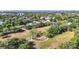 Expansive aerial view of the park featuring a playground, mature trees, and a sidewalk at 917 W Alfred St, Tampa, FL 33603