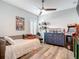 Bedroom featuring wood flooring and a built-in bed at 917 W Alfred St, Tampa, FL 33603