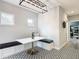 Eat-in nook features bench seating, modern lighting, and stylish black and white patterned flooring at 917 W Alfred St, Tampa, FL 33603