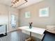 Bright breakfast nook featuring bench seating, stylish floors, and a view of the backyard at 917 W Alfred St, Tampa, FL 33603