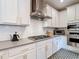 Contemporary kitchen featuring stainless steel appliances, white subway tile, and gas range at 917 W Alfred St, Tampa, FL 33603