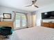 Main bedroom with wood floors and patio access at 917 W Alfred St, Tampa, FL 33603