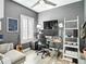 Office featuring natural light, custom desk, and a comfortable chair at 917 W Alfred St, Tampa, FL 33603