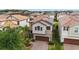 This property features solar panels, a brick driveway, two-car garage, and a manicured front yard at 935 Terra Vista St, Brandon, FL 33511