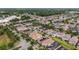 An aerial view of a residential community with manicured lawns, mature trees and beautiful homes at 935 Terra Vista St, Brandon, FL 33511