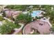 Community amenities include a pool, playground, building and bike rack with lush landscaping throughout at 935 Terra Vista St, Brandon, FL 33511