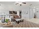 Open floor plan with living room and kitchen featuring neutral color scheme and modern decor at 935 Terra Vista St, Brandon, FL 33511
