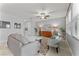Bright living room featuring recessed lighting, a ceiling fan, and neutral colored walls and tile flooring at 935 Terra Vista St, Brandon, FL 33511