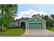 Charming single-story home with a well-manicured lawn and a two-car garage at 10118 Cleghorn Dr, San Antonio, FL 33576