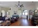 Comfortable living room with hardwood floors, bright lighting and stylish décor at 10118 Cleghorn Dr, San Antonio, FL 33576