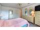 Bedroom with ceiling fan, dresser, and storage at 103 El Turco Ct, Sun City Center, FL 33573