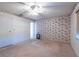 Spacious bedroom boasting carpet flooring, a ceiling fan, and neutral walls for a serene atmosphere at 103 El Turco Ct, Sun City Center, FL 33573