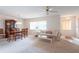 Bright living room and dining area featuring neutral carpet and lots of natural light at 103 El Turco Ct, Sun City Center, FL 33573