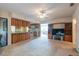 Bright living room with a seamless transition to the kitchen and dining areas at 103 El Turco Ct, Sun City Center, FL 33573