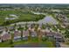 Aerial view showcasing home, beautiful landscaping and water view at 10734 Breaking Rocks Dr, Tampa, FL 33647