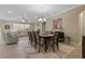 Open concept dining room with views of the living room at 10734 Breaking Rocks Dr, Tampa, FL 33647