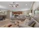Open floor plan featuring a spacious living room and modern kitchen with a breakfast nook at 10734 Breaking Rocks Dr, Tampa, FL 33647